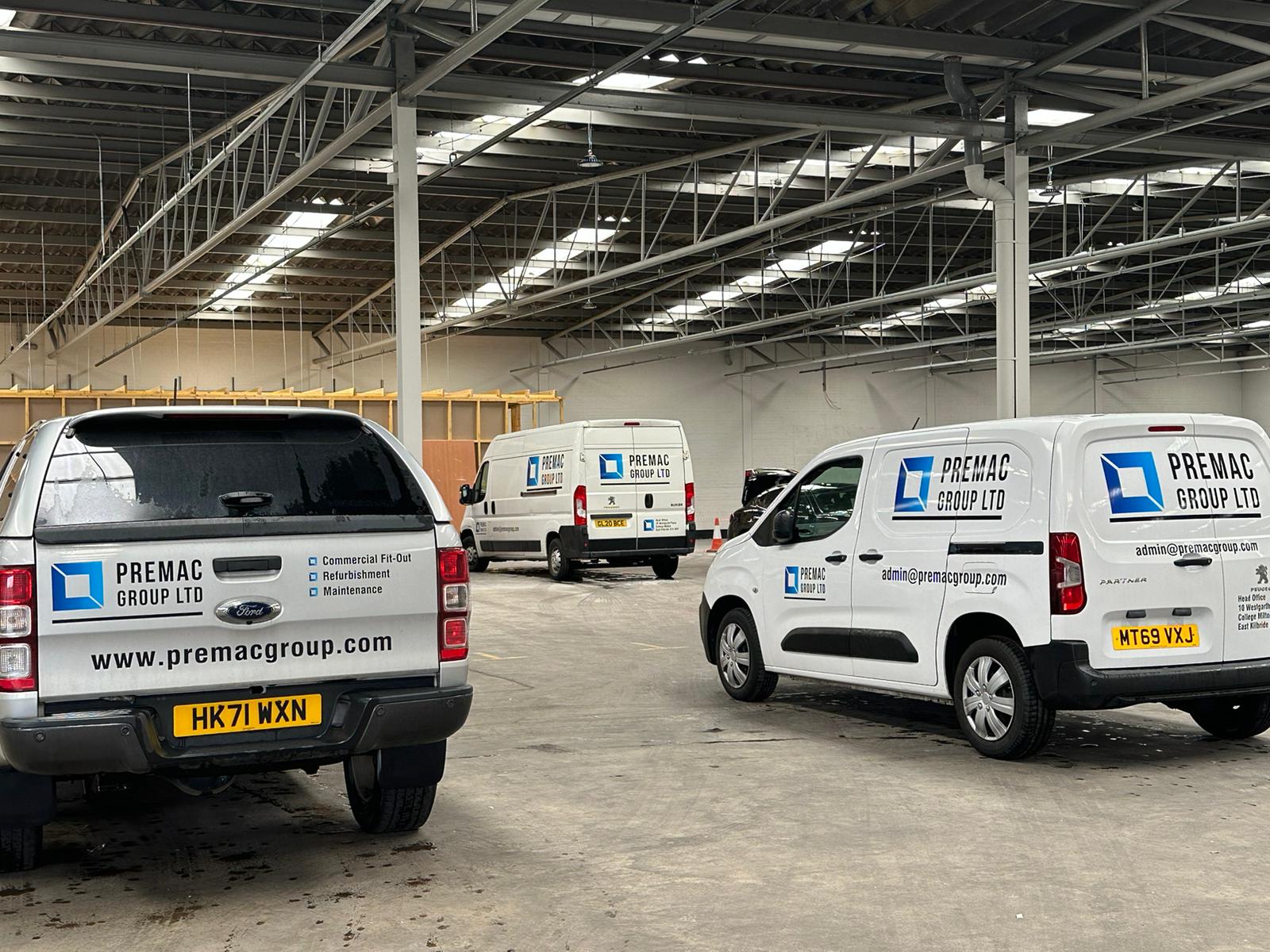 Premac fleet vehicles parked on-site